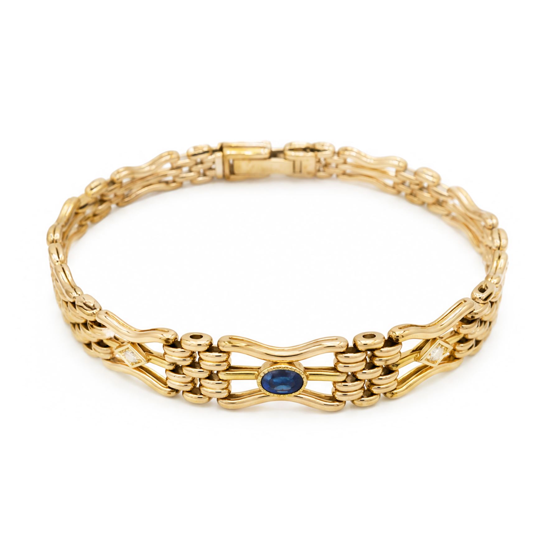 Early 20th century 15ct diamond and sapphire gate link bracelet, set with two oval cut sapphires and two old cut diamonds, stamped 15