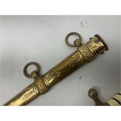 WW2 German kreigsmarine style dagger composed from various age parts, the post-war 25cm double fullered blade  with etched decoration and inscribed WKC with knight's head; in gilt brass scabbard with two rings L42cm overall