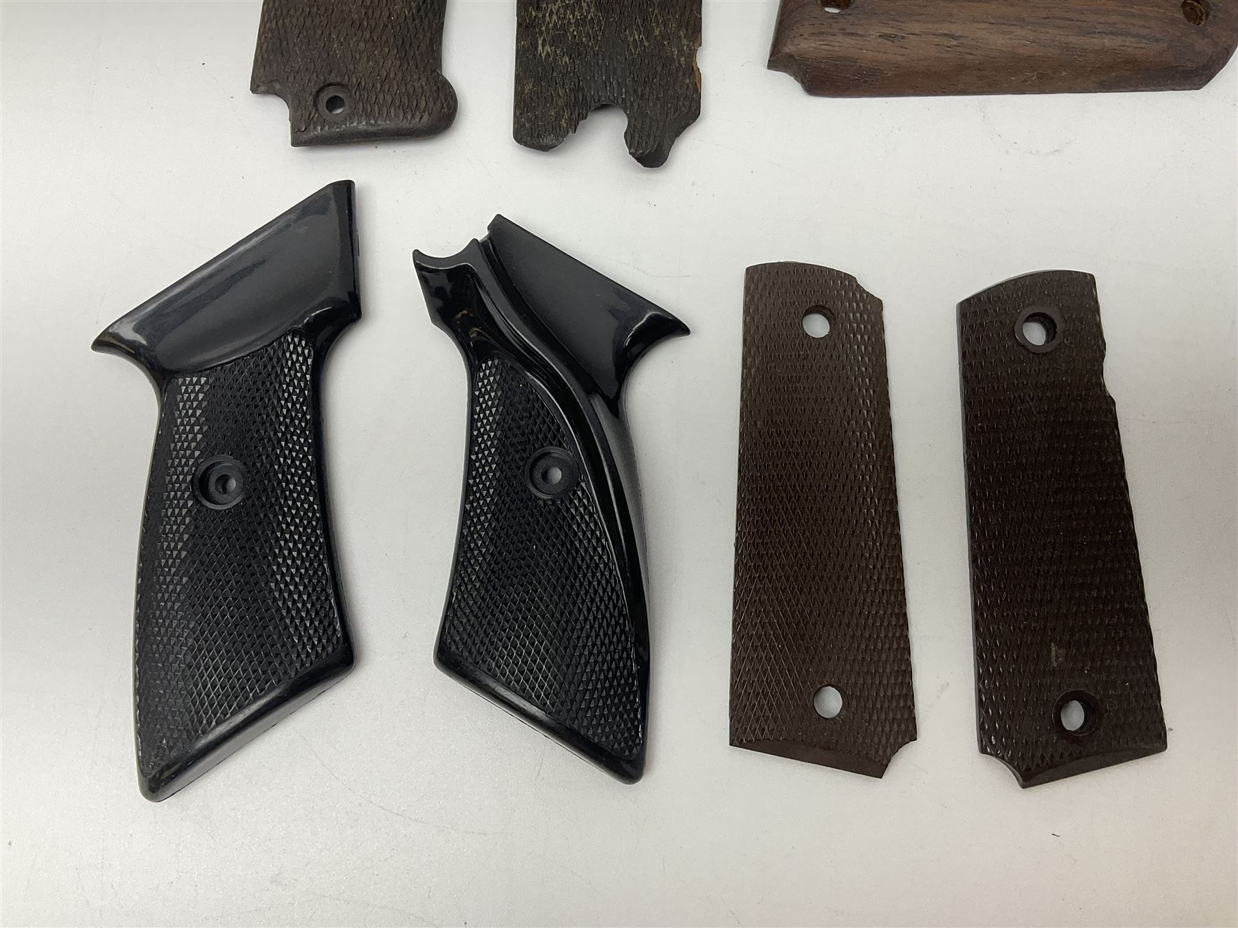 Six pairs of revolver grips;  pair of Lightwood & Son Ltd powder/shot measures in original box; and boxed Colt hammer shroud 