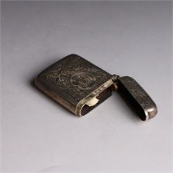 1920s silver cigarette case, with engraved initials and foliate decoration to cover and personal engraving to interior, hallmarked Smith & Bartlam, Birmingham 1924, with a similar silver vesta case, hallmarked, cigarette case H8.5cm