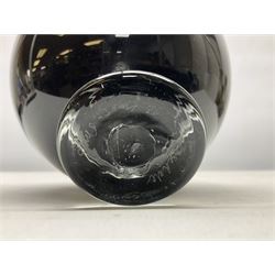 Gillies Jones of Rosedale; art glass specimen vase, shaped as a black ball upon a short clear tapering foot, with engraved marks beneath, H16cm