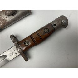 WW1 British 1907 pattern bayonet, the 43cm single edged fullered blade stamped to the ricasso with a crown GR cypher 1907 8 15 Sanderson, with various ordnance marks verso, two piece walnut grip, pommel stamped 1HLI 354; in steel mounted leather scabbard stamped 140 to the throat L57cm overall