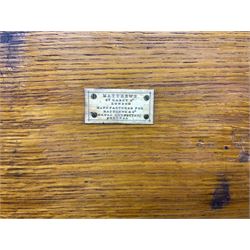 Naval doctor's surgical instruments, contained in a converted brass bound oak pistol box, the hinged lid opening to reveal two removable fitted trays, containing 19th century and later saws, scalpels, tweezers etc