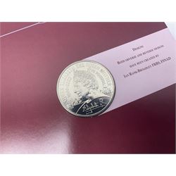 Eleven Queen Elizabeth II cupronickel five pound coins, in card folders or on cards