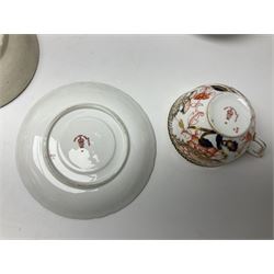 Early 19th century and later, eleven Royal Crown derby teacups and saucers in various patterns, to include Imari, Garden platter, and others, all with printed or painted marks beneath