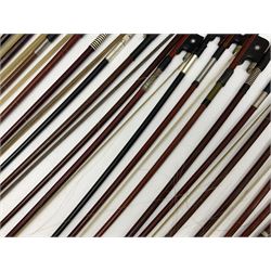 Twenty-eight violin/cello bows/part bows in pernambuco, brazilwood, fibre-glass etc