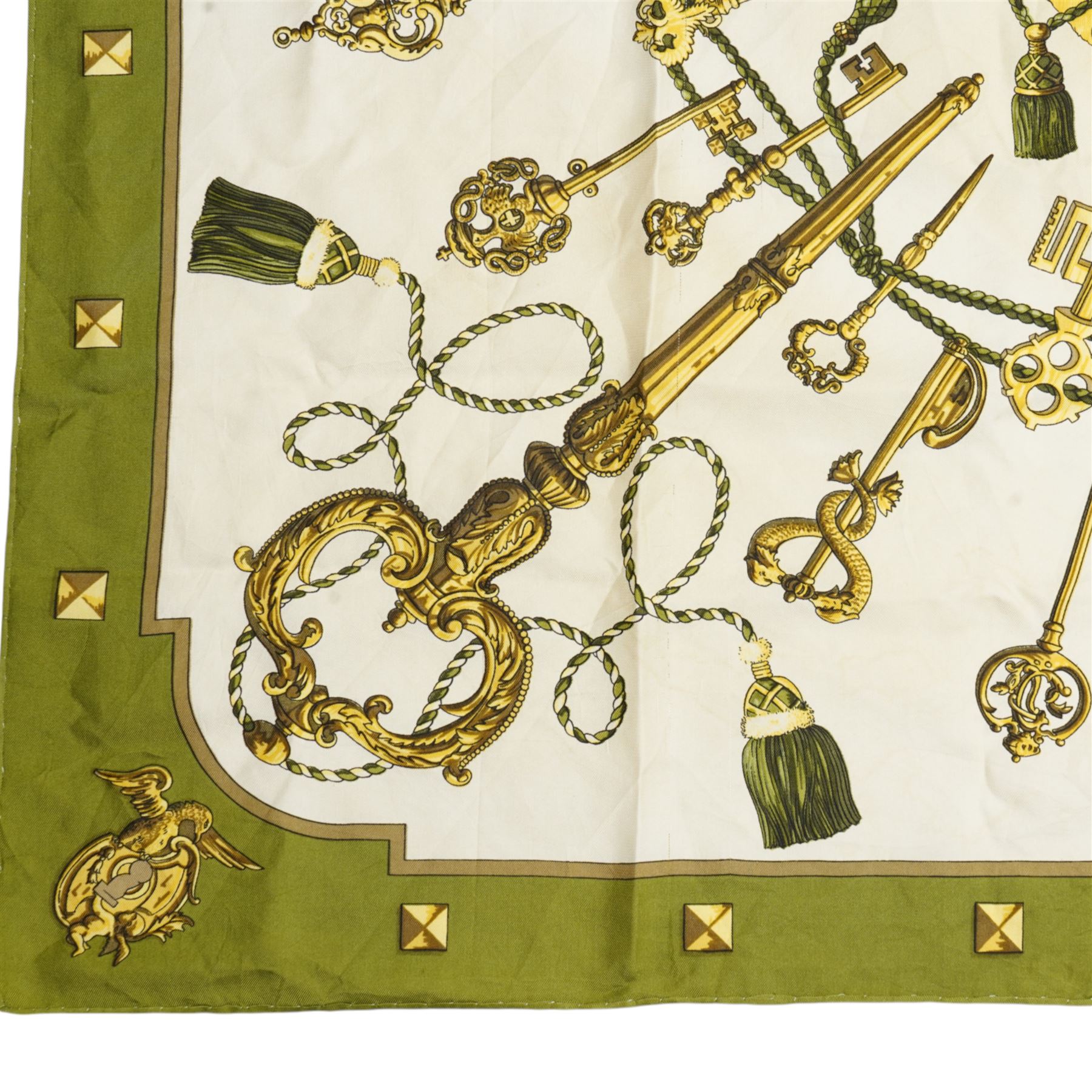 Hermes 'Les Clefs' silk scarf in green and gold colourway, designed by Cathy Latham, 86cm x 90cm 