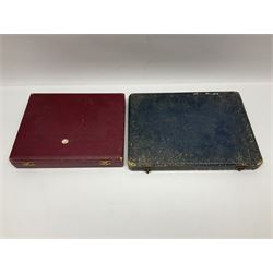 Set of six stag horn handled knives by Cooper Brothers and Sons, together with a set of silver plated dessert knives and forks for six place settings, both within fitted cases