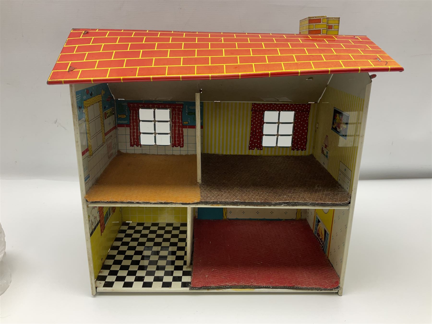 Mid-century Marx style tin dollhouse and quantity of dolls house furniture, H35cm