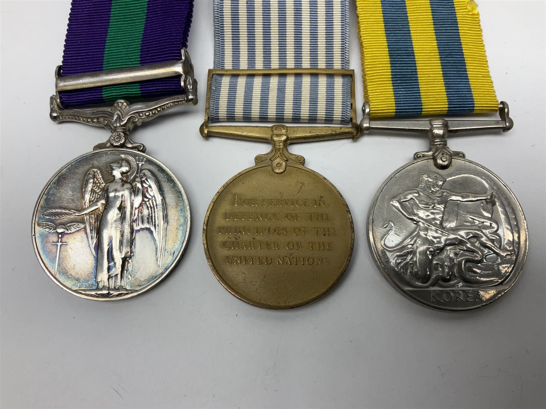 Korean War group of three medals comprising ERII Korea Medal awarded to 22307852 Pte. M. McGill R.A.M.C., UN Korea Medal and ERII General Service Medal with Malaya clasp to 22307852 Cpl. M. McGill R.A.M.C.