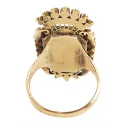 19th century 18ct gold portrait ring, set with an octagonal miniature of a woman wearing a pink dress on ivory, under a glazed panel, within a milled bezel and garnet surround, surmounted by a coronet set with seed pearls and further garnets. This lot has been registered for sale under Section 10 of the APHA Ivory Act