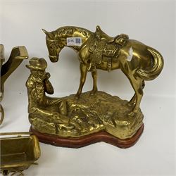 Three brass figures, one depicting a cowboy and his horse, two of horses and carts, largest H30cm