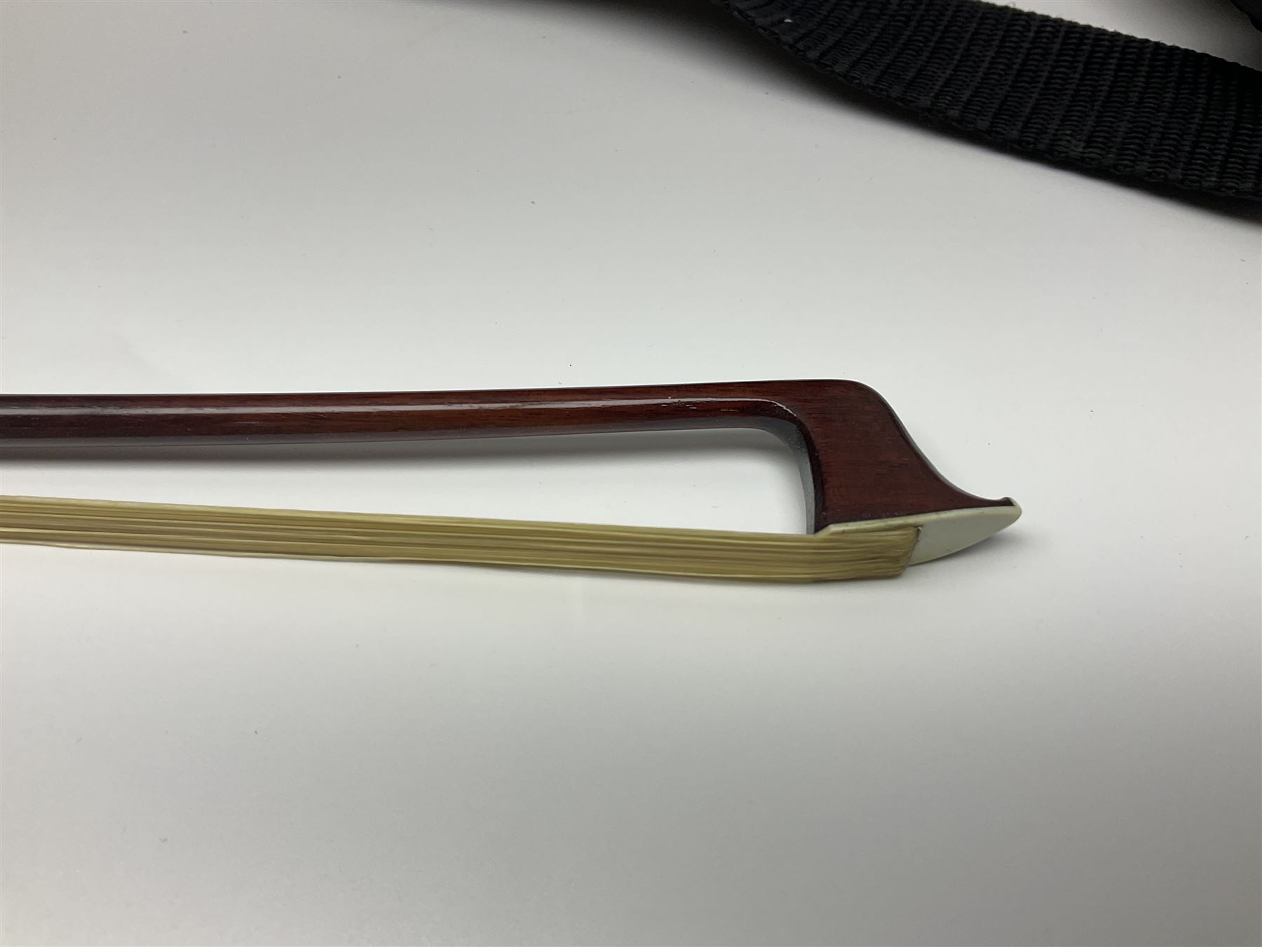 Early 20th century French Mirecourt violin with 35.5cm two-piece maple back and ribs and spruce top; bears label 'The Garrodus Violin H & Co No.1587 Anno 1912' L59cm overall; in modern fitted case with bow