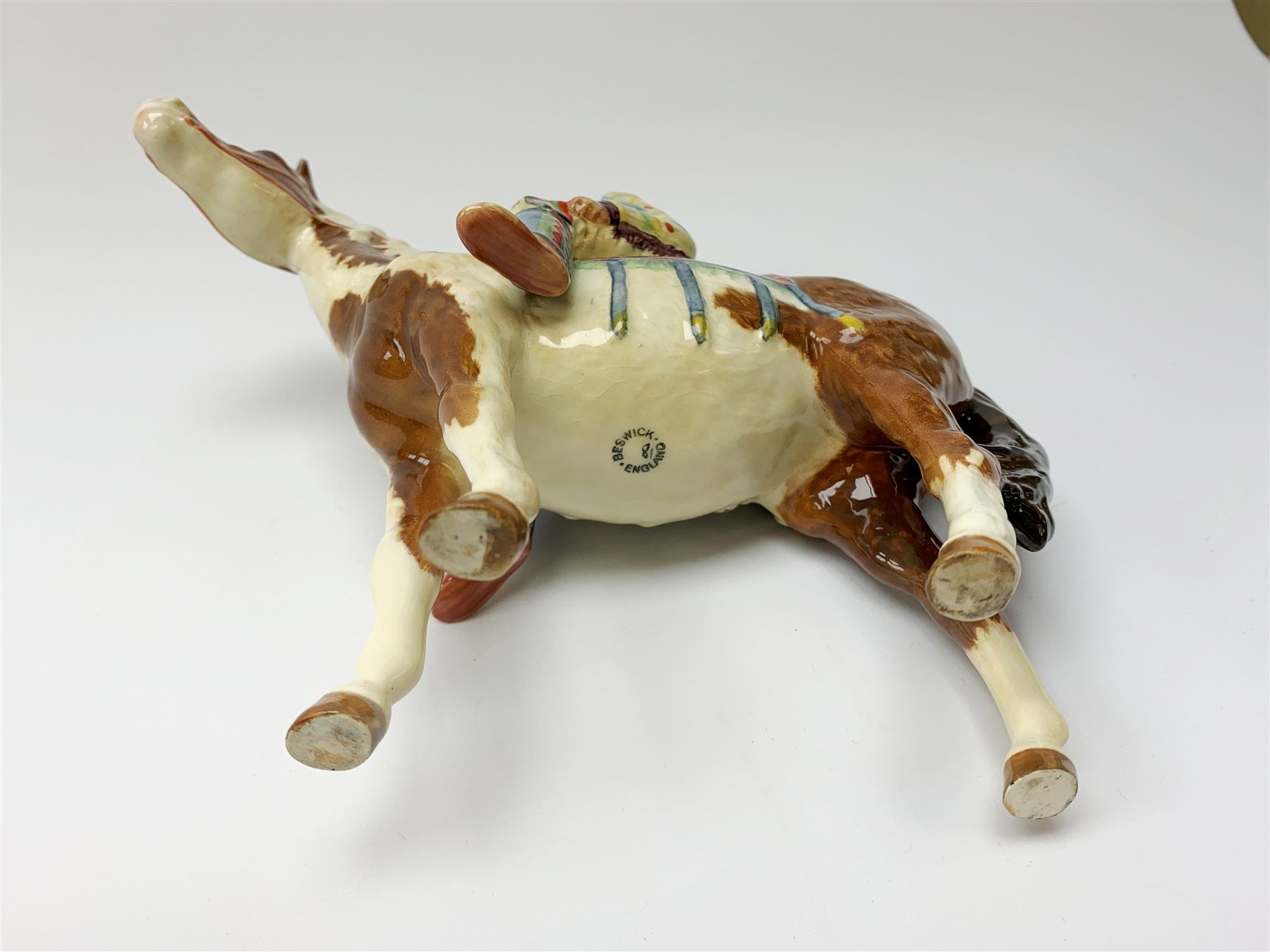 A Beswick Native American on horseback, with printed mark beneath, H21.5cm. 