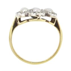 Early 20th century 18ct gold and silver ruby, diamond and pearl flower head cluster ring, single octagonal cut ruby of approx 0.30 carat, with old cut and rose cut diamond and split pearl surround