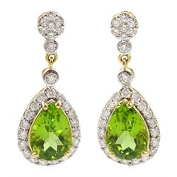 Pair of 18ct gold pear shaped peridot and round brilliant cut diamond cluster stud earrings, peridot approx 4.70 carat, total diamond weight approx 0.90 carat