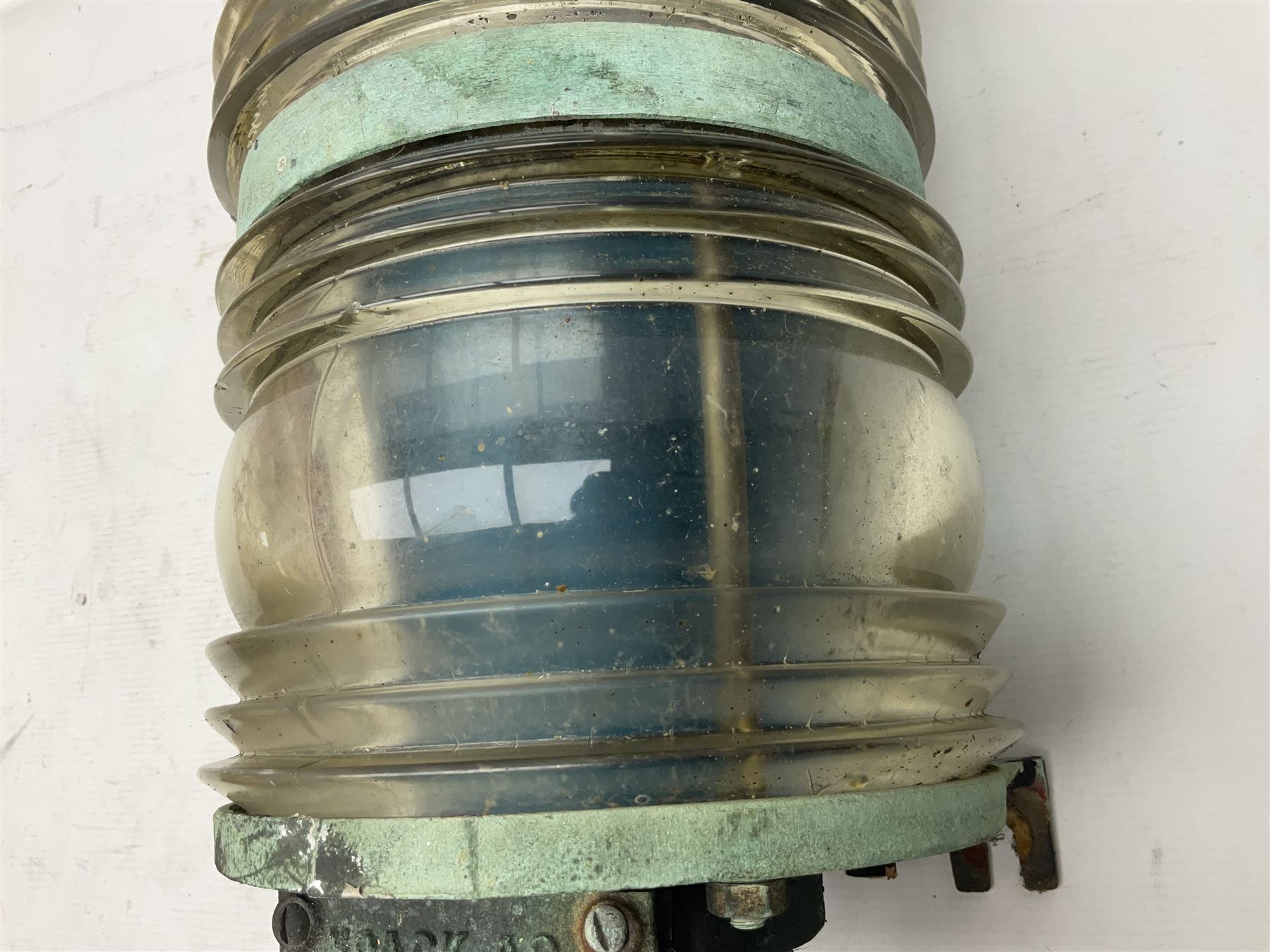 Two port and starboard brass lamps, each with a plaque marked 'Noack as Lanterne KL.A Serie 700 Type 704D Babord', ribbed green and red glass shades, H44cm