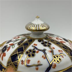 Early 20th century Royal Crown Derby teapot, decorated in a variant of the Imari pattern with blue and red prunus blossoms, with printed mark beneath including illustration date code for 1927, H14cm
