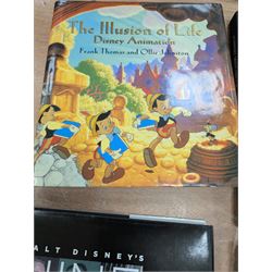 Collection of Disney animation and drawing books, including Walt Disney's Nine Old Men flipbooks, three Nine Old Men reference books, Marc Davis Walt Disney's Renaissance Man, A Disney Sketchbook and The Illusion of Life (7)