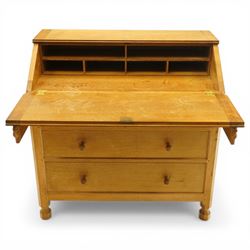 Mouseman - oak adzed bureau, fall front with carved mouse lopers, with fitted interior, above two short over two long drawers, by the workshop of Robert Thompson of Kilburn
