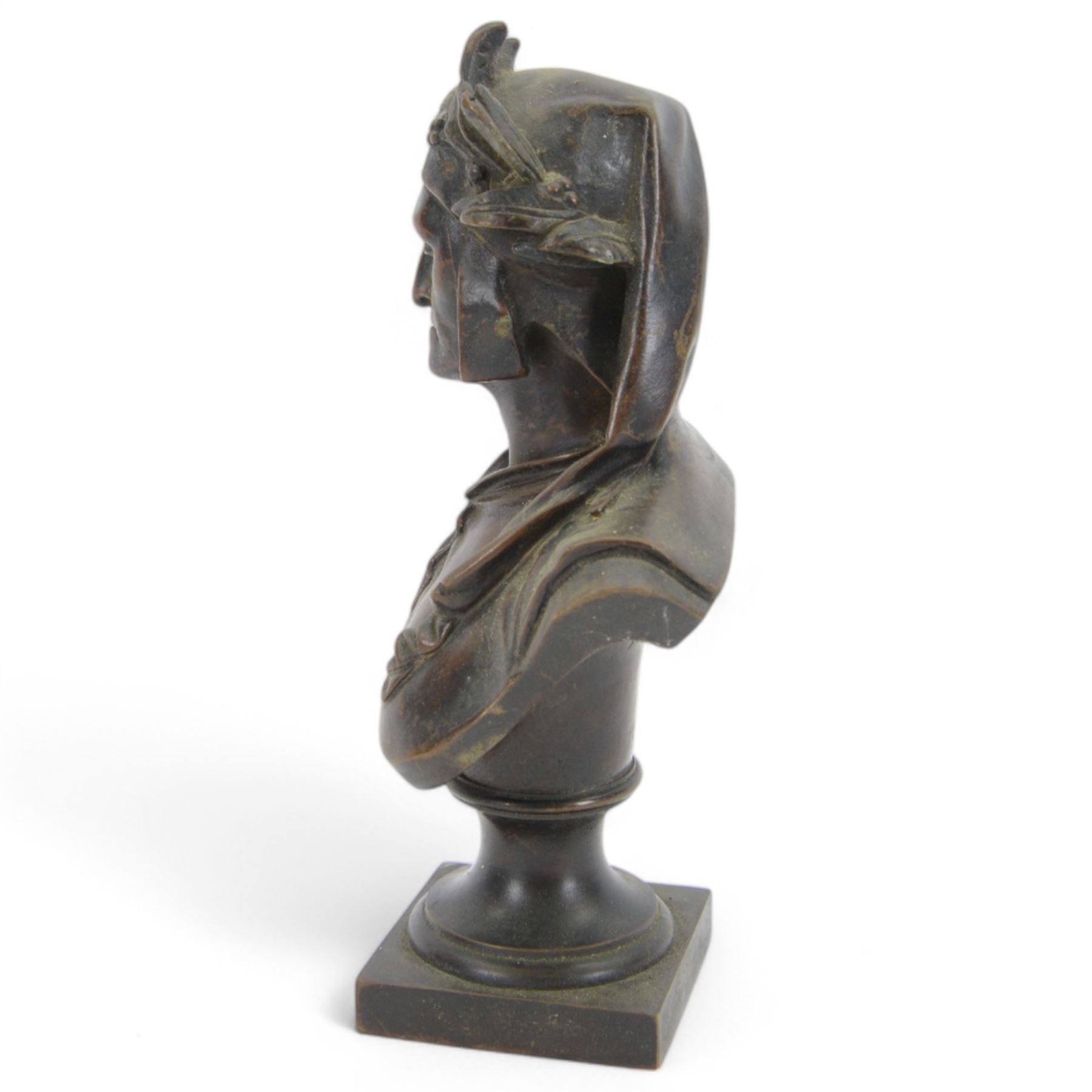 After A. Carrie, bronze bust depicting Dante Aligheri, upon socle and square plinth, signed verso with foundry mark, H22cm