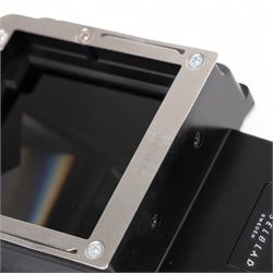 Hasselblad 500C medium format camera, serial no. TC60836, circa 1965, with Carl Zeiss Planar 1:2.8 f=80mm lens with cap, serial no. 4199654, one film back, serial no. TC87300 and a Hasselblad PM5 prism viewfinder serial no. 401EE1335