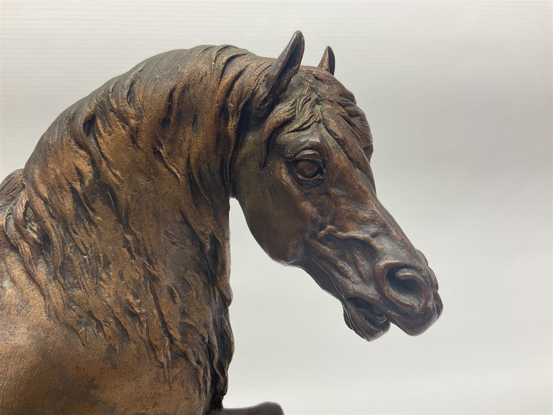 After P J Mene, bronze figure of a horse on a stepped oval base, H31cm 