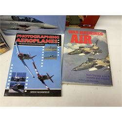 Ten books of predominantly military aircraft interest including Aircraft Anatomy World War Two, Hurricane Messerschmitt, The Avro Lancaster, The Luftwaffe Album, Encyclopaedia of Aircraft of WWII etc; together with a scrap album of WW2 newspaper cuttings