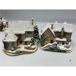 Five Lilliput Lane Illuminated Cottages, comprising Christmas is Coming, with box and deed, Christmas at Mol's, with box and deed, Christmas in Canterbury, with box and deed, Christmas Lights at Sweet Delights and The Three Kings, with box and deeds, together with twelve other Lilliput lanes, to include The First Noel, with box and deed, Winters Moonlight, Yuletide treats, with box and deed etc (17)