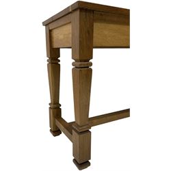Solid oak console table, rectangular top raised on turned square supports united by stretcher
