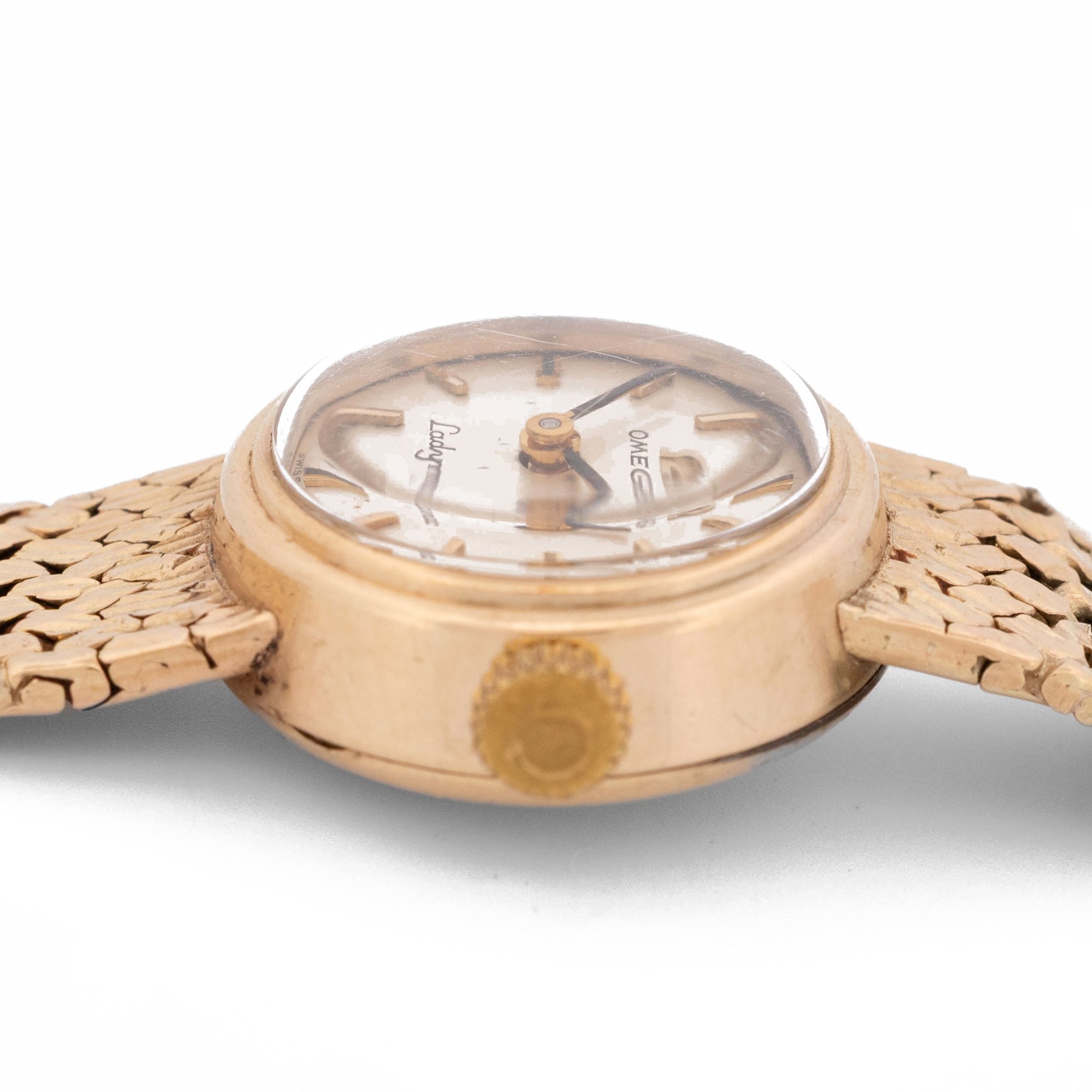 Omega Ladymatic 9ct gold automatic wristwatch, Cal. 661, silvered dial with baton hour markers, on integral 9ct gold bracelet, Birmingham 1968