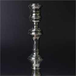 Pair of silver candlesticks, with knopped stems and upon spreading circular weighted bases, hallmarked William Comyns & Sons Ltd, London 1979, H20cm