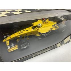 Three Minichamps 1:18 scale die-cast racing cars - Jordan Mugen Honda 198 D. Hill; Jordan Ford EJ13 G. Fisichella; and Stewart Ford SF 1 R. Barrichello; all boxed (3)