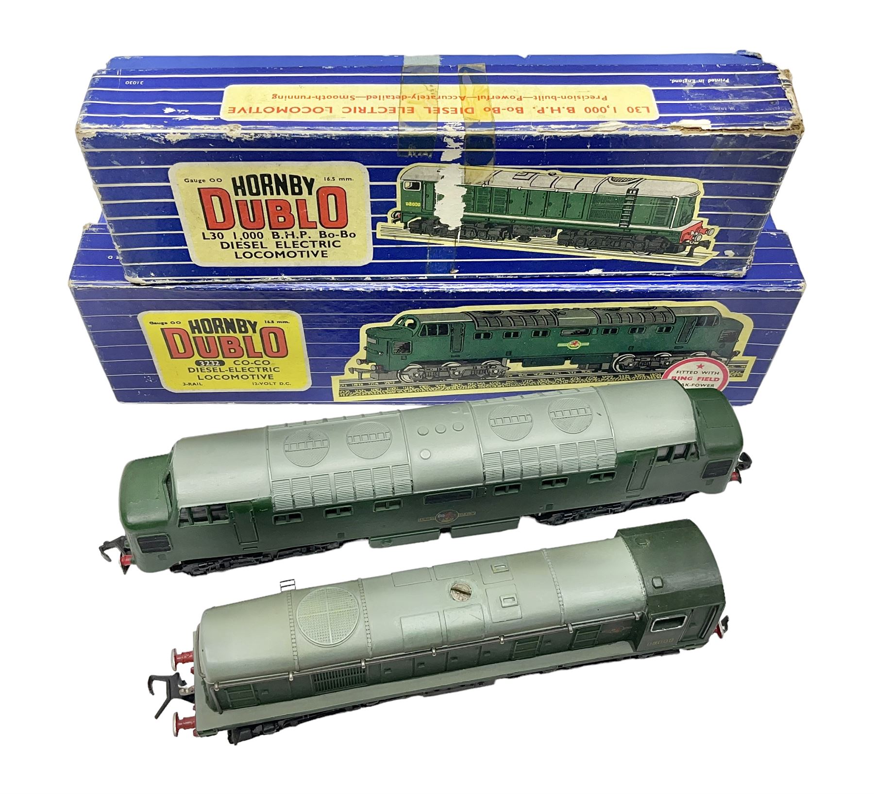 Hornby Dublo - three-rail - Deltic Type Diesel Co-Co locomotive with instructions and guarantee; and Class 20 1000 B.H.P. Bo-Bo Diesel Electric locomotive No.D8000; both in BR green; and each in original blue striped box (2)

