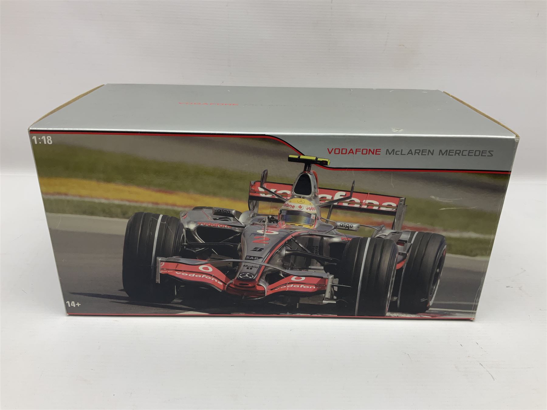 Mattel Hot Wheels 1:18 scale die-cast racing car - Vodaphone McLaren Mercedes; boxed with stand