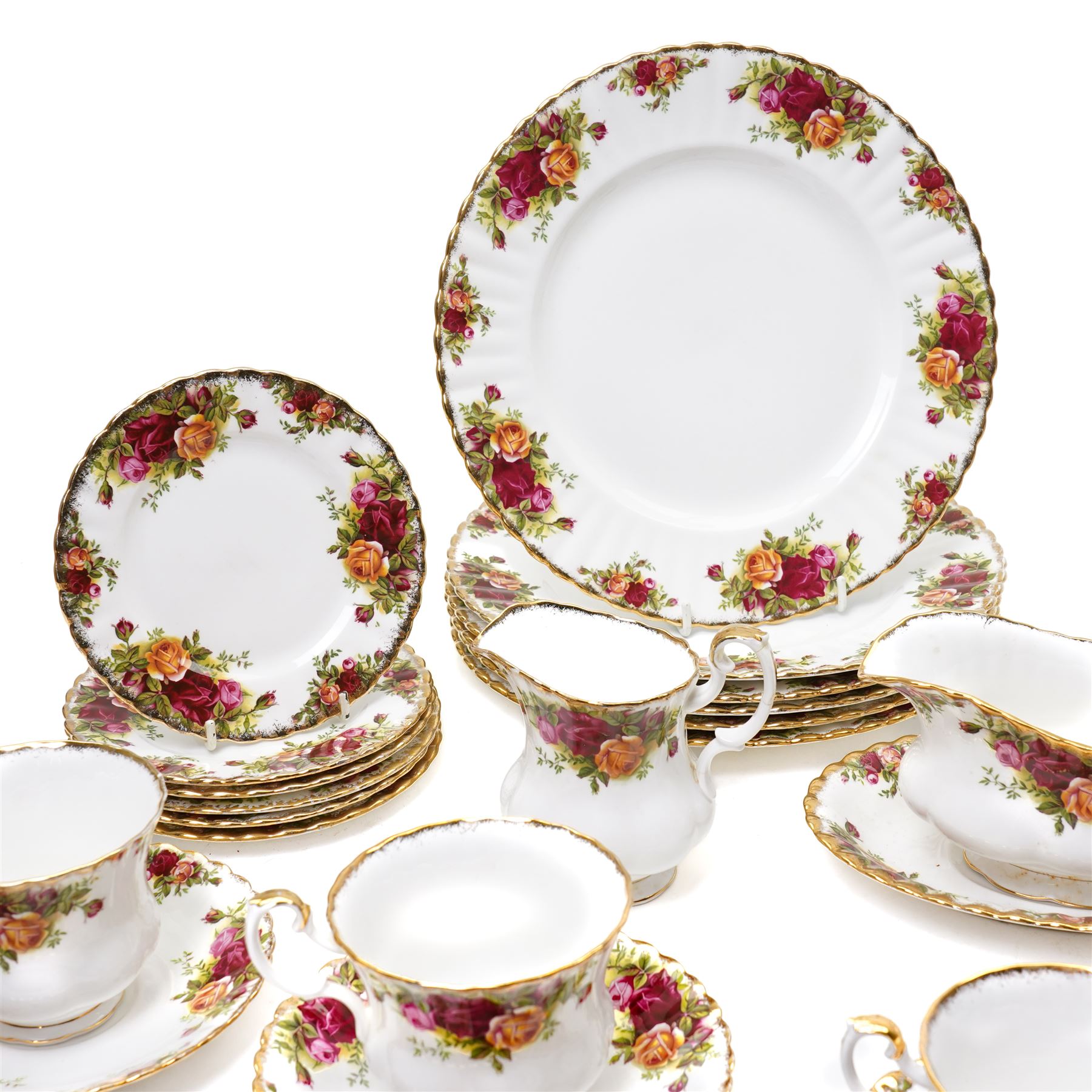Royal Albert Old Country Roses tea and dinner ware comprising six dinner plates, five dessert bowls, sauce boat and stand, four breakfast cups and saucers, three tea cups and four saucers, six tea plates, milk jug, sugar bowl and bread and butter plate