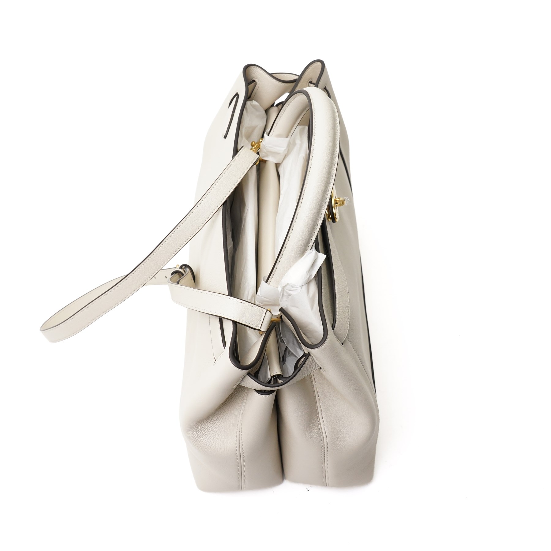 Mulberry - Islington handbag in Chalk Silky Calf leather with black piping, the structured body with single rolled top handle, gold-tone Postman’s Lock fastening and front strap detail, with detachable and adjustable shoulder strap, opening to a spacious two-division interior with Mulberry monogram fabric lining, with original Mulberry product tag, care booklet and dust bag, unused