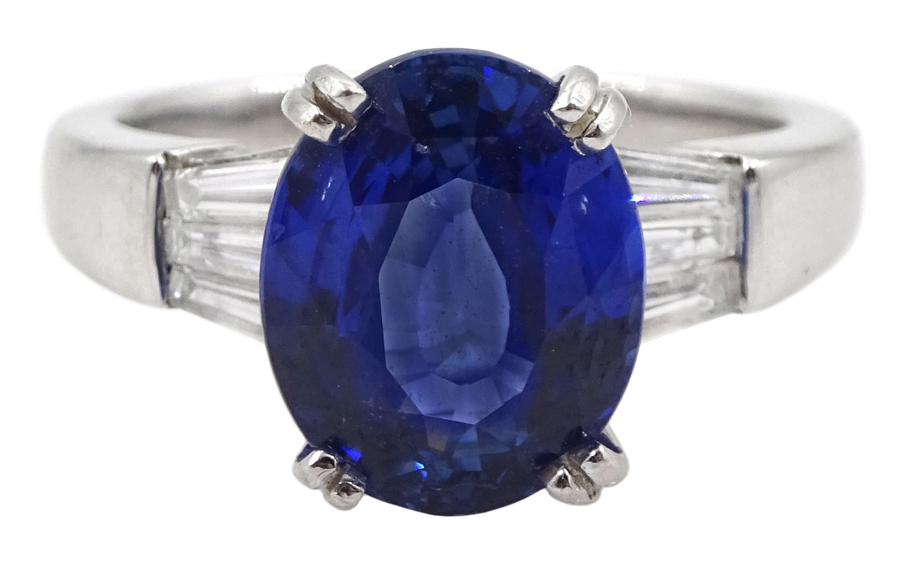 18ct white gold oval sapphire ring, with tapered baguette diamond shoulders, sapphire approx 4.15 carat