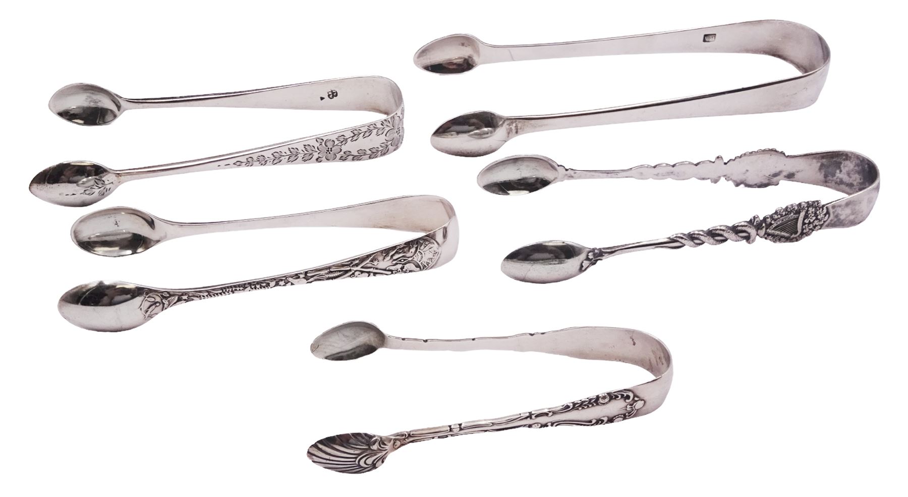 Five pairs of silver sugar tongs, comprising Edwardian pair with harp, shamrock, and serpent modelled arms, hallmarked John Round & Son Ltd, Sheffield 1909, George IV pair, hallmarked London 1823, makers mark indistinct, a Victorian pair with foliate engraved decoration, hallmarked Wakely & Wheeler, London 1885, a further Victorian pair, and an Edwardian pair, approximate total weight 4.26 ozt (132.4 grams)