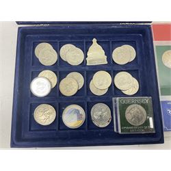 Commemorative coinage including crowns, Alderney 2015 five pounds, etc, housed in a coin box