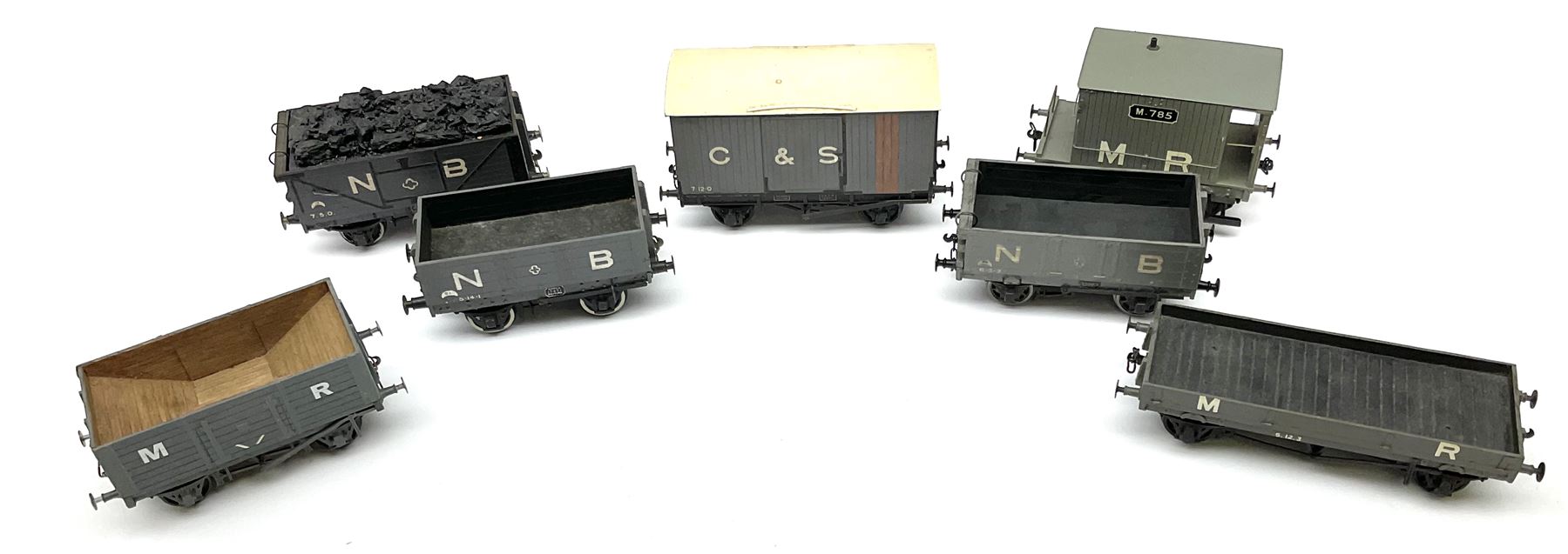 '0' gauge - three scratch-built Midland Railway wagons including brake van, hoppered wagon and long flat bed wagon; three similar North British wagons; and G. & S.W. covered wagon; all unboxed (7)