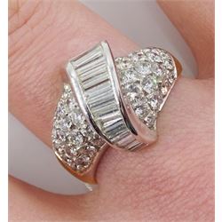 18ct white and yellow gold channel set baguette diamond ring, with pave set round diamonds either side, stamped 750