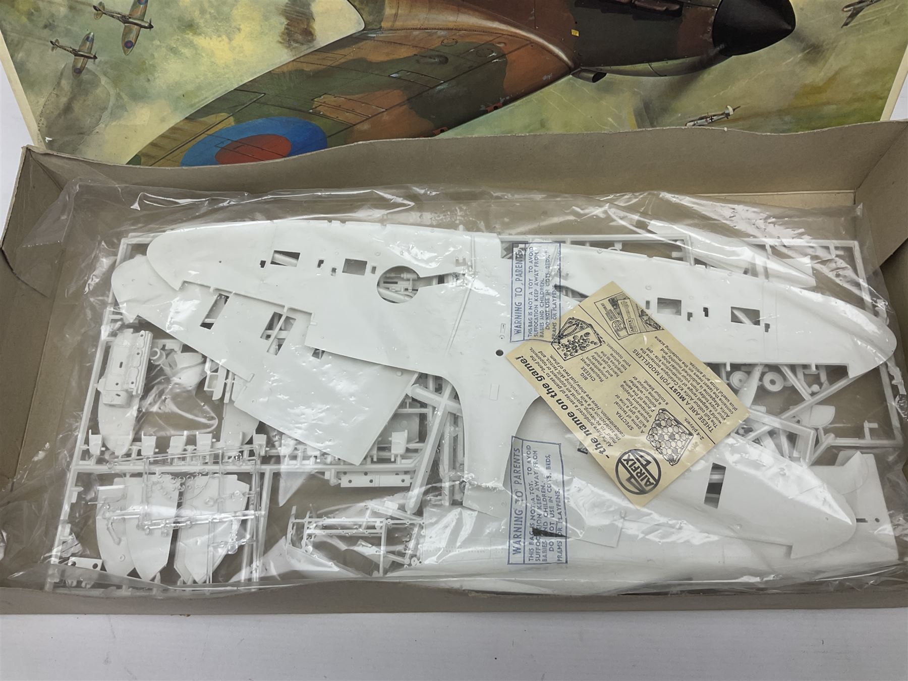 Three unmade construction kits - Airfix 1:24 scale Supermarine Spitfire Mk.1A; predominantly in unopened factory packaging with instructions and decal sheet; Frog Shell Welder with instructions; and Airfix Battle of Waterloo Farmhouse (instructions on box base); all boxed (3)