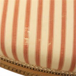 20th century Louis XVI style beech salon suite, comprising settee and four chairs, the settee with shaped rectangular back and upholstered arms over a shaped seat, the chairs with rectangular backs and overstuffed seats, each upholstered in striped fabric with close-nailed borders, upon fluted tapering supports headed by carved paterae, terminating in toupie feet, chairs H89cm W47cm