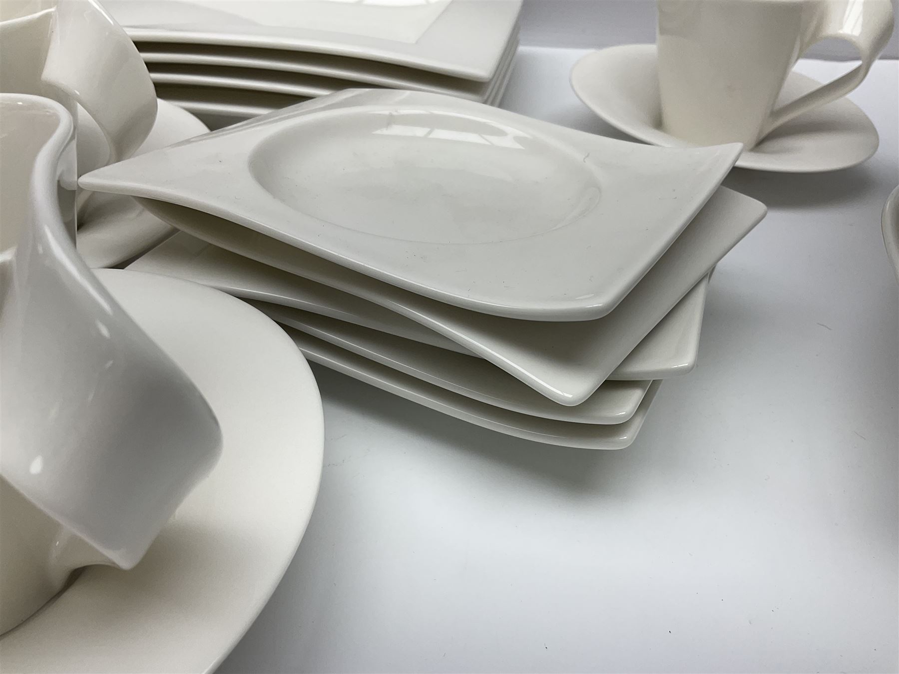 Villeroy & Boch New Wave pattern dinner and tea service for five people, comprising square dinner plates, rectangular dinner plates, pasta bowls, cereal bowls, coffee cups and saucers, side plates and dessert plates, all with printed mark beneath