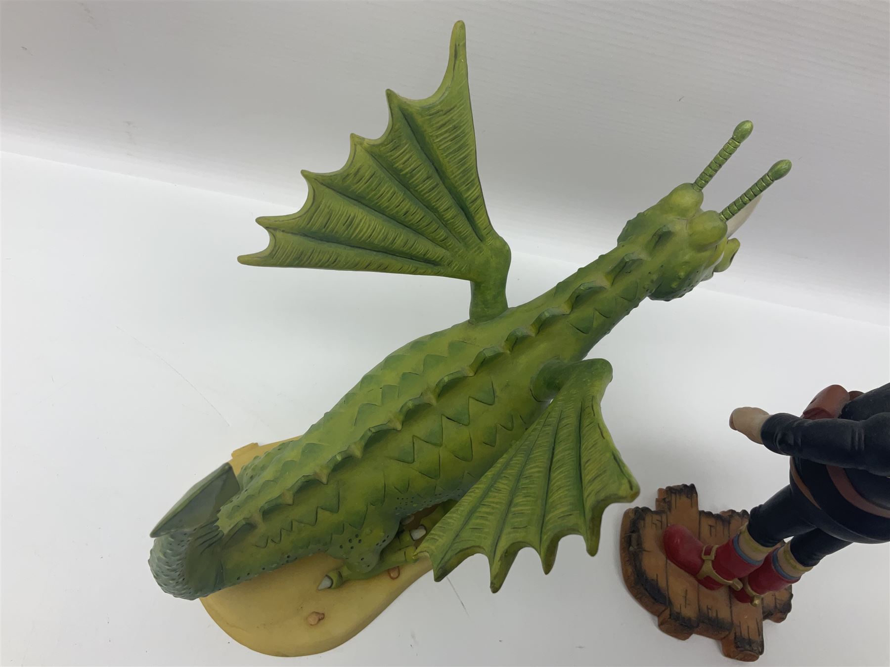 Eleven Robert Harrop figures from various collections, comprising limited edition The Trumpton Fire Engine Musical Box CGMB8 no. 359/1000, The Dragon from the Red Knight BN09, Bulldog Fireman DP165, Pointer Fire Chief DP184, Dalmatian New York Fire Fighter DP234, Dalmatian Fire Fighter DP191; Desperate Dan ‘Fireman Dan’ BDS11, Cuthbert CG13, Pugh (Clarinet) CG70, The Soup Dragon CL05 and Baby Dragon CL06