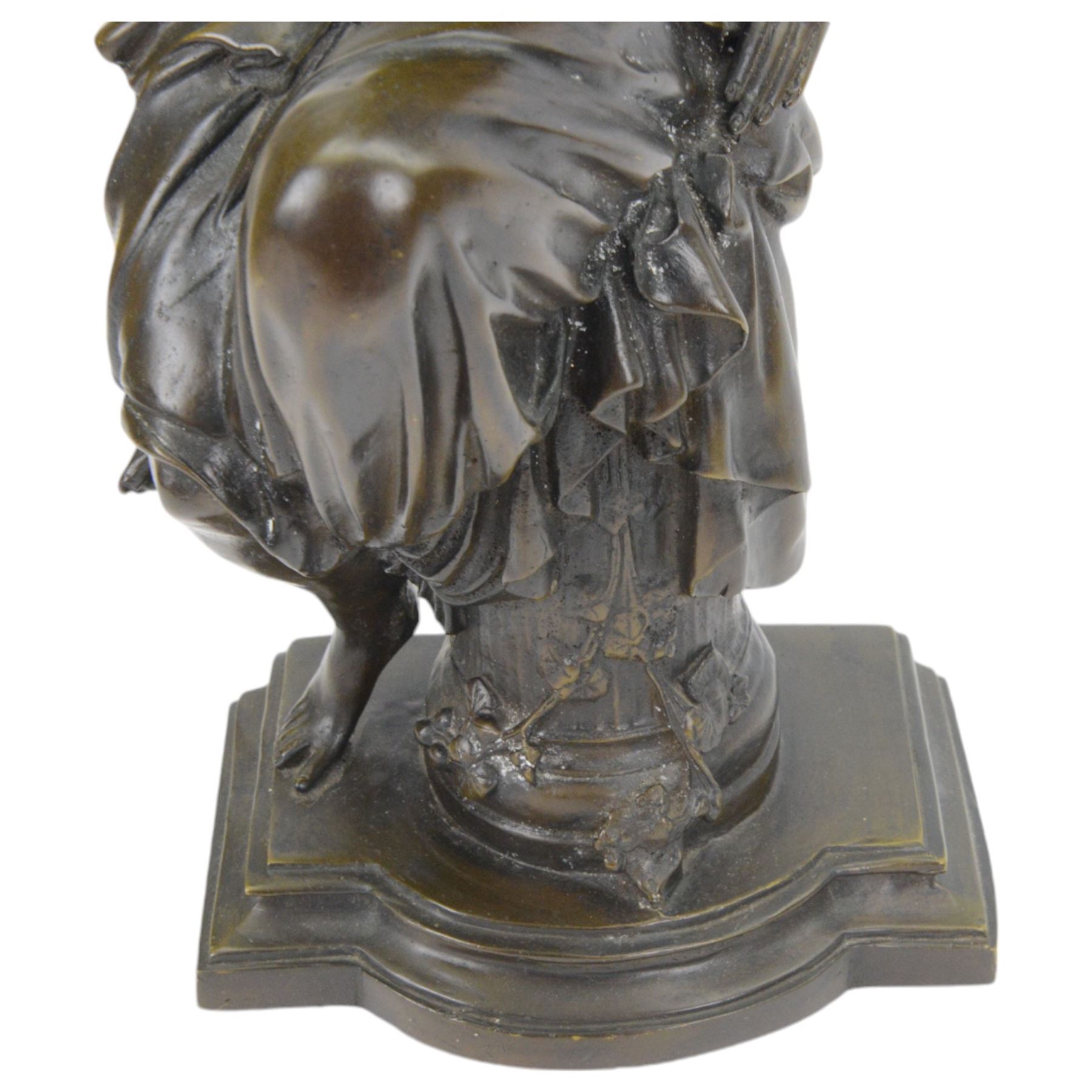 After Joseph Charles De Blezer, bronze figure modelled as a woman in neoclassical dress seated upon a column, H45cm