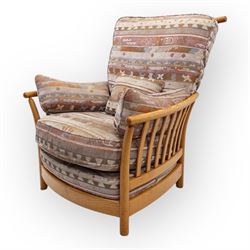 Ercol - Renaissance ash and elm high back armchair, upholstered in geometric Kilim pattern...