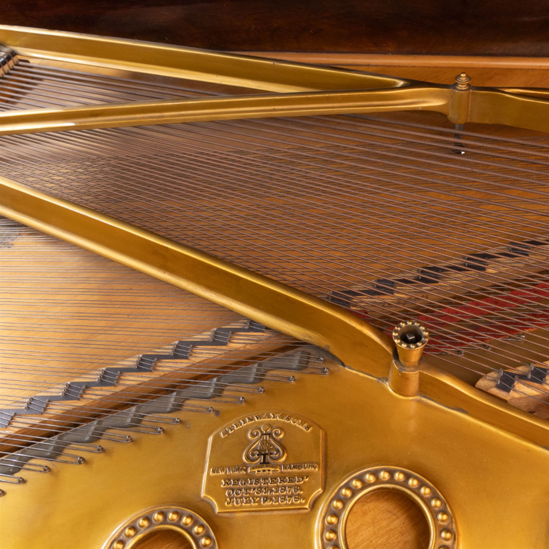 Steinway & Son, New York & Hamburg- Model B, overstrung Drawing Room Grand Piano in a rosewood case, Serial No 87297 (1896/7), with 85 ivory covered and ebony keys A0-A7(7 octaves) with an adjustable fretted music desk, brass fittings and pedals, Steinway “Fireplug” straight columnar and fluted legs with roller castors and conforming lyre, duplex stringing with agraffs, bass strings copper wound with a steel core, steel tuning pins, original Steinway action, hammers, keys, felts, and dampers, with una-corda, sostenuto and sustain pedals, Overstrung iron frame detailing numerous Steinway patents, awards, and features. Tuned to Concert pitch (A=440). 
With an adjustable single stool. 

This item has been registered for sale under Section 10 of the APHA Ivory Act HLB1KY67