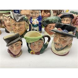 Collection of Royal Doulton and Beswick character jugs of various sizes, including North American Indian D6611, The Falconer D6533,  Tony Weller 281, Sairey Gamp 371 etc